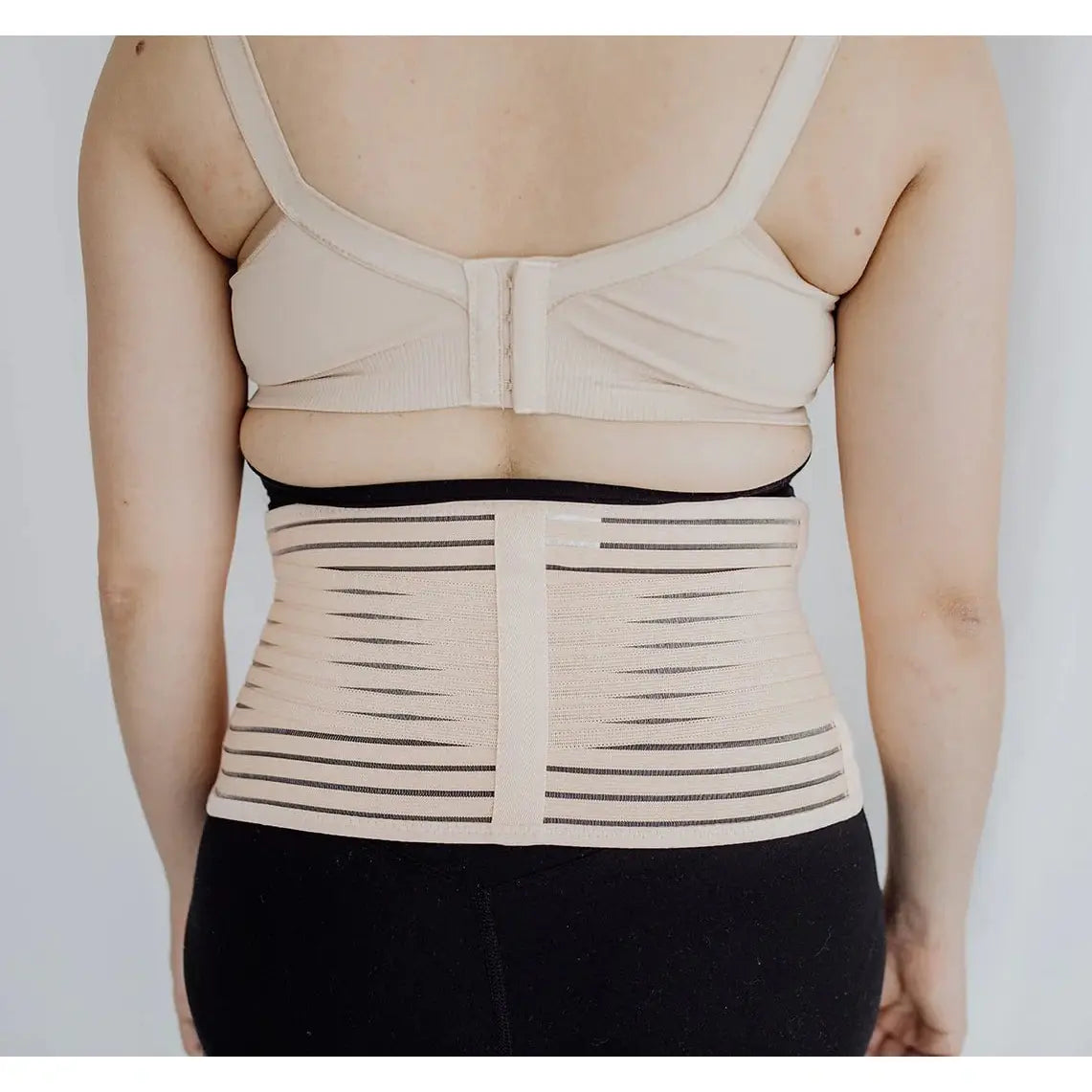 back view of Women wearing postpartum belly band around waist